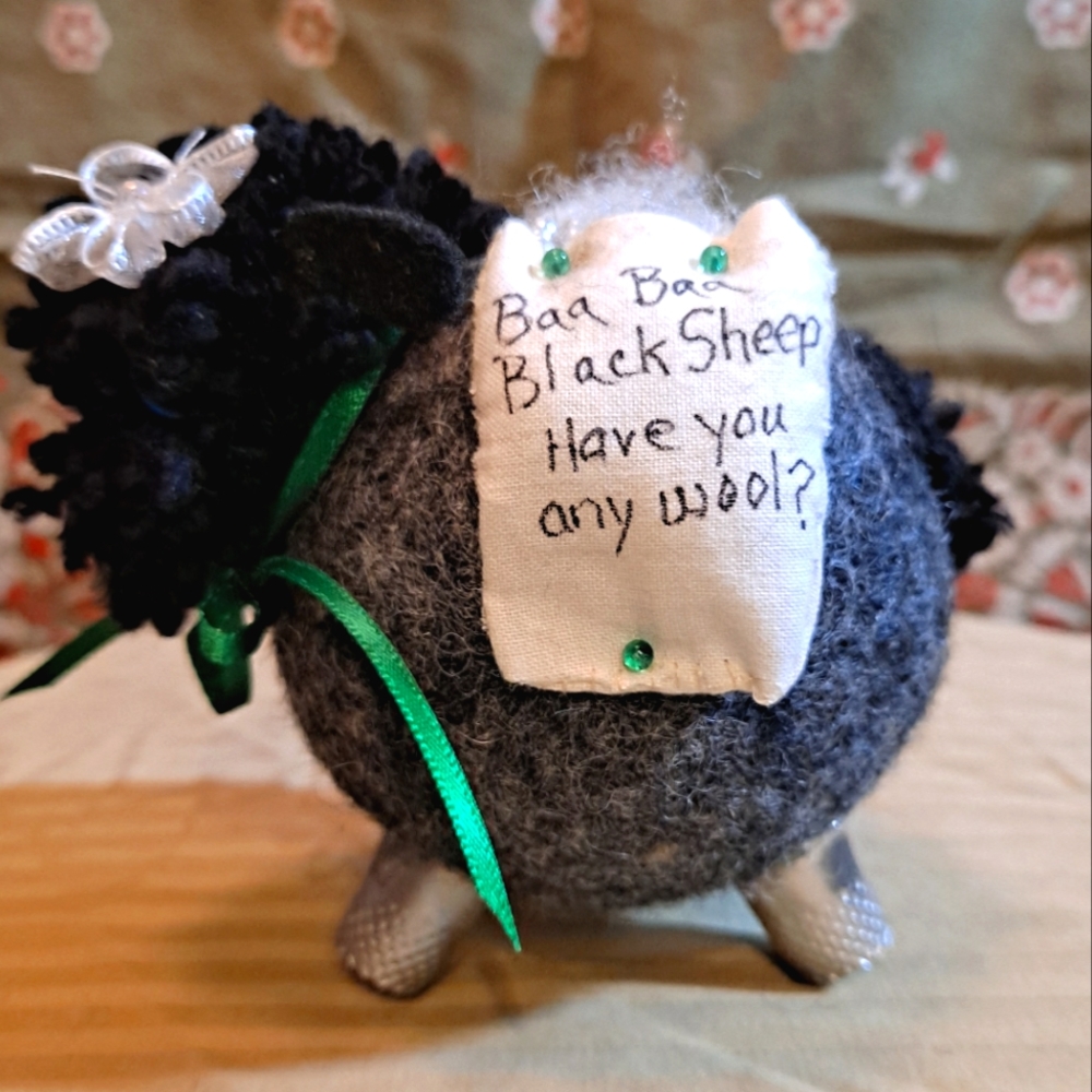 Homemade pin holder/art piece